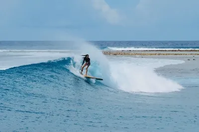 Surfing � Experience at COMO Maalifushi