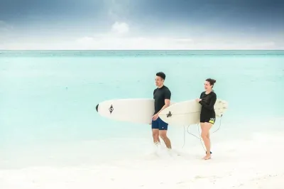 Surfing � Experience at Club Med Finolhu Villas