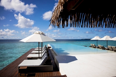 Undaras Overwater Infinity Pool Bar � Dining at Heritance Aarah Maldives